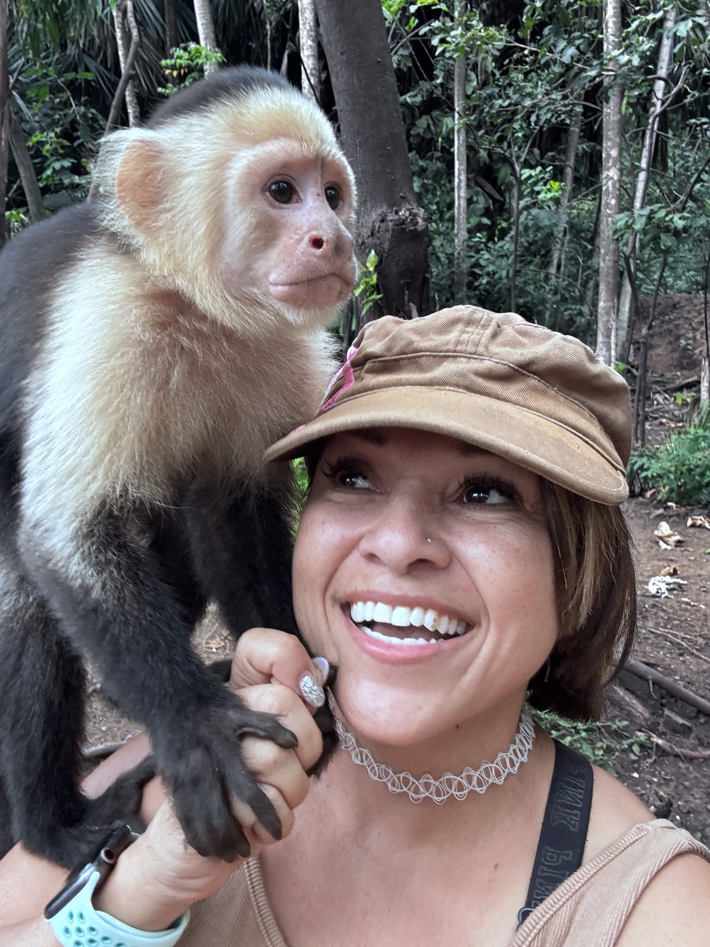 Scheyla with a friendly monkey in Costa Rica